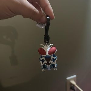 dc peacemaker exclusive key chain